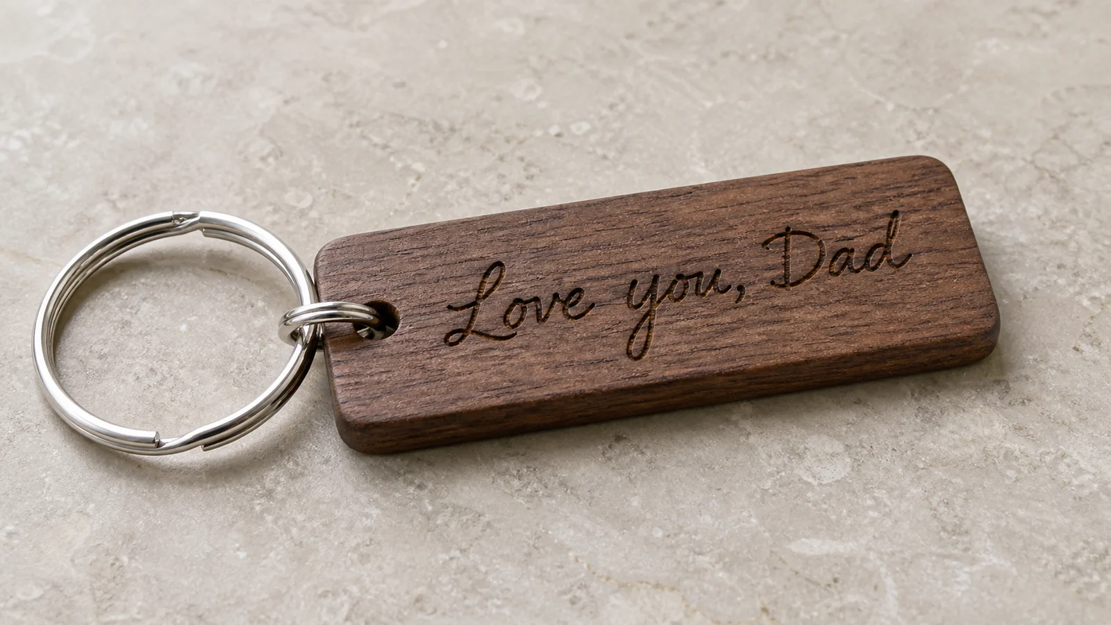 Personal handwriting laser engraved on a walnut keychain